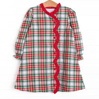  Bleu features a beautiful combination of timeless elegance and charm, curated with intricate details and crafted from premium fabrics! This dress features a red plaid print, a red ruffle scalloped trim, and red covered buttons. 