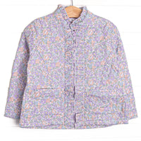 Quilted details, a full-length zipper for easy use, purple floral print, and front pockets to keep little hands warm.