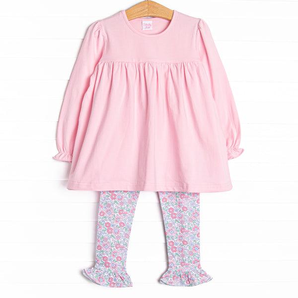 This set features a pink ruffle top with coordinating pink floral leggings to match.
