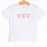 The tee is featured in four colors: Heather Gray, Soft Blue, , Ballerina Pink, and White.