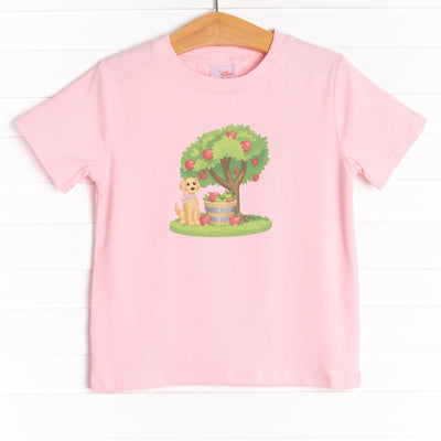This shirt is featured in four colors: Ballerina Pink, Soft Blue, White, and Heather Gray with a puppy and apple tree graphic.