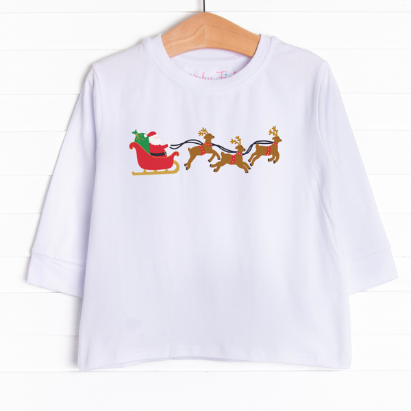  This graphic tee features Santa in his sleigh on the center of one of our long sleeve tees available in 5 colors: Ballerina Pink, Soft Blue,&nbsp; White, Navy, and Heather Gray. 