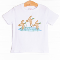 The shirt is featured in four colors; White, Heather Gray, Ballerina Pink, and Soft Blue with a mallard graphic.