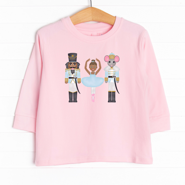  Our Holiday at the Ballet Graphic Tee features the cutest ballerina and nutcrackers graphic in the center. 