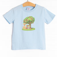 This shirt is featured in three colors: Soft Blue, White, and Heather Gray with a puppy and apple tree graphic.