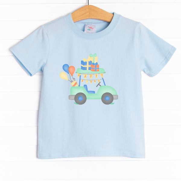 The shirt is featured in three colors; White, Heather Gray, and Soft Blue with a festive graphic.