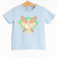 This shirt is featured in four colors: White, Heather Gray, Ballerina Pink, and Soft Blue with a baseball graphic. 