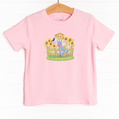 This shirt features four colors: Ballerina Pink, Soft Blue, White, and Heather Gray with a scarecrow graphic