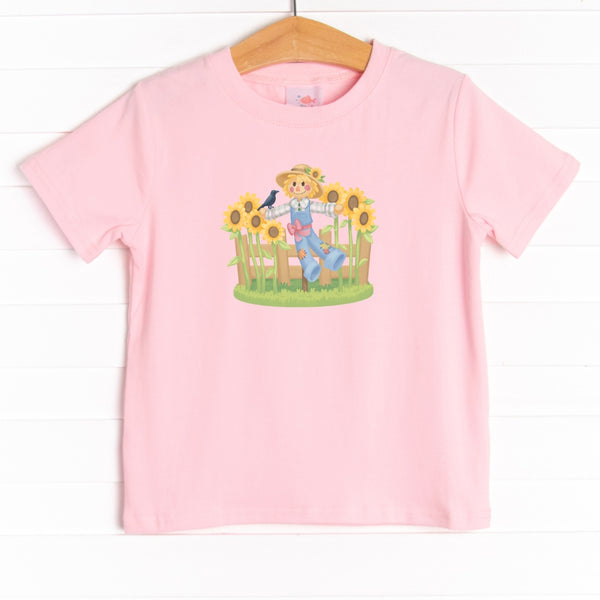 This shirt features four colors: Ballerina Pink, Soft Blue, White, and Heather Gray with a scarecrow graphic