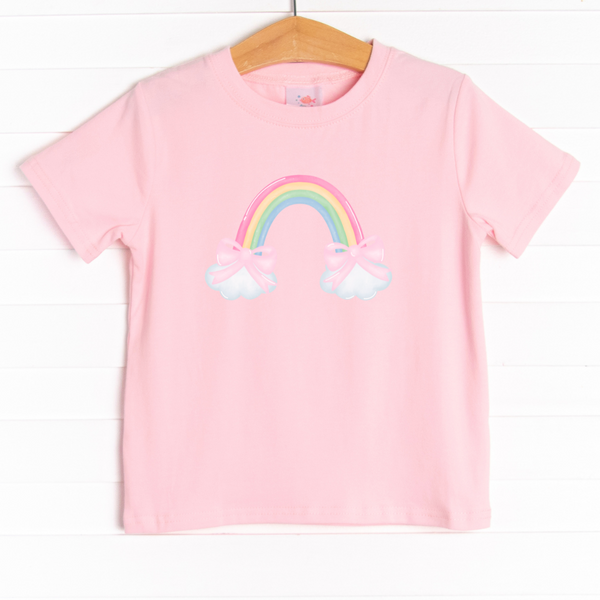 The shirt is featured in four colors; White, Heather Gray, Ballerina Pink, and Soft Blue with an rainbow and pink bow graphic.