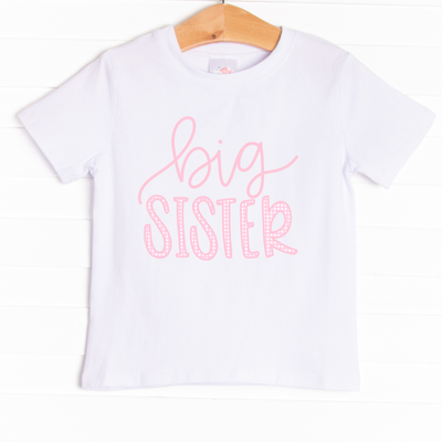 The shirt is featured in three colors; White, Heather Gray, and Soft Blue with a Big Sister graphic. 