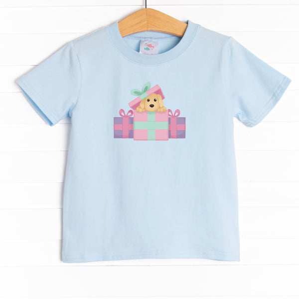  The shirt is featured in four colors; White, Heather Gray, Ballerina Pink, and Soft Blue with a puppy present graphic. 