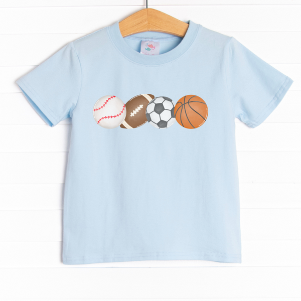 &nbsp;This shirt is featured in four colors: White, Heather Gray, Ballerina Pink, and Soft Blue with a sports ball graphic. 