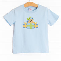 The shirt is featured in three colors: White, Heather Gray, and Soft Blue with a puppy present graphic.