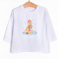 This long sleeve tee is featured in 3 colors: White, Heather Gray, and Soft Blue with an ice-skating puppy graphic.