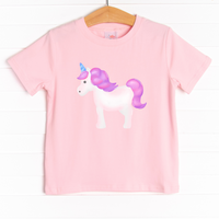  The shirt is featured in four colors; White, Heather Gray, Ballerina Pink, and Soft Blue with a unicorn graphic. 