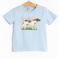 The shirt is featured in four colors: White, Heather Gray, Ballerina Pink, and Soft Blue with a pointer graphic. 