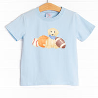  The shirt is featured in four colors: White, Heather Gray, Ballerina Pink, and Soft Blue with a puppy graphic. 