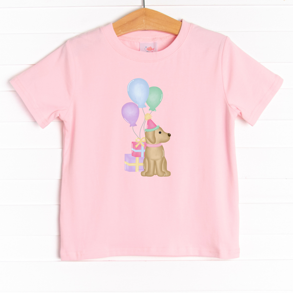  This shirt is featured in four colors: White, Heather Gray, Ballerina Pink, and Soft Blue with a party puppy graphic. 