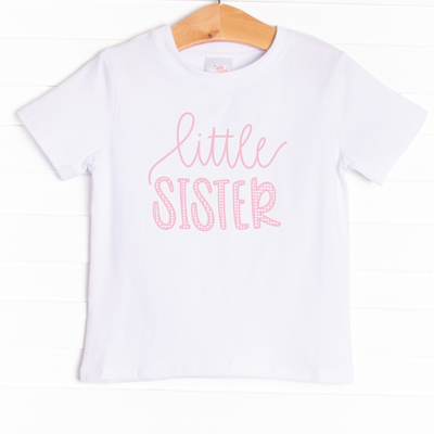 The shirt is featured in three colors; White, Heather Gray, and Soft Blue with a Little Sister graphic.