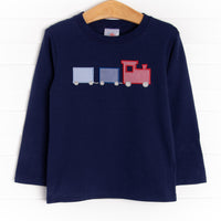  A long sleeve knit top in navy with three train applique. 
