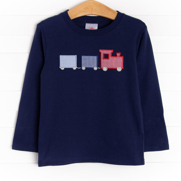  A long sleeve knit top in navy with three train applique. 
