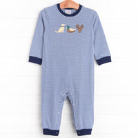  This&nbsp;navy blue striped long sleeve romper with dog, mallard and deer head trio details is a must have. 